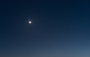 Cosmic conjunction crescent moon, Jupiter, Venus, Mercury and stars © Cavan