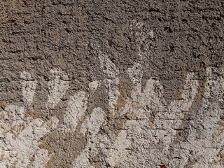 Fototapeta premium A rough gray concrete wall texture background, featuring natural grainy details and mottled patches