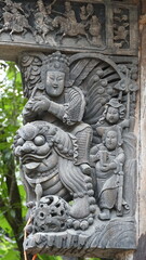Fototapeta premium Buddhist Art Collection of Longtan Ancient Temple in Pujiang: Stone Carvings, Wood Carvings, and Architectural Artifacts