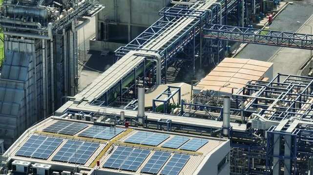 Aerial drone view of a combined cycle power plant, highlighting energy transition, hybrid power systems, ESG goals, industrial decarbonization, and resilient energy infrastructure. 4k.
