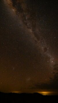 The Milky Way night sky as clouds roll in