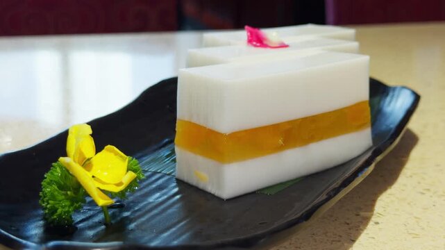 Cantonese Mango Coconut Milk Cake Layered Dessert Handheld Slow Pan Shot