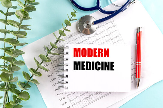 Modern medicine concept with stethoscope medical report and notepad on blue background representing healthcare diagnostics