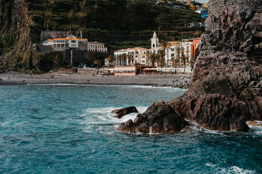 Scenic view of a coastal village Ponta do Sol from the ocean