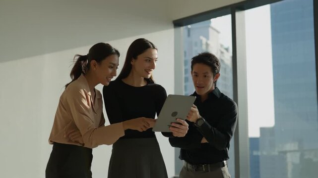 Business team high five office tablet celebration coworker success woman man in modern workplace with city window professional teamwork digital project discussion cooperation