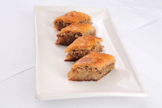 Baklava Pastries Arranged on a White Plate