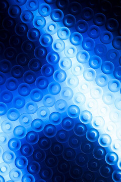 3D azure ring wave curves through a vertical wallpaper.