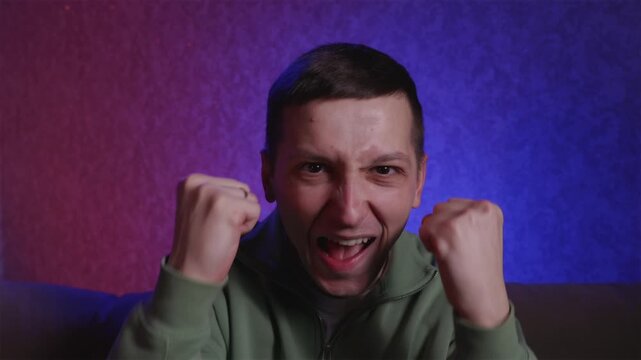 Happy fan celebrating goal or point in sports game