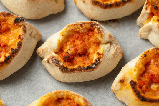 Italian Salami Pizza Bites on baking paper