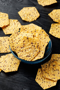 Seeded Tortilla Crackers in a Blue Bowl