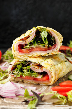 Crispy Zucchini Cheddar Wrap with Ham and Fresh Vegetables
