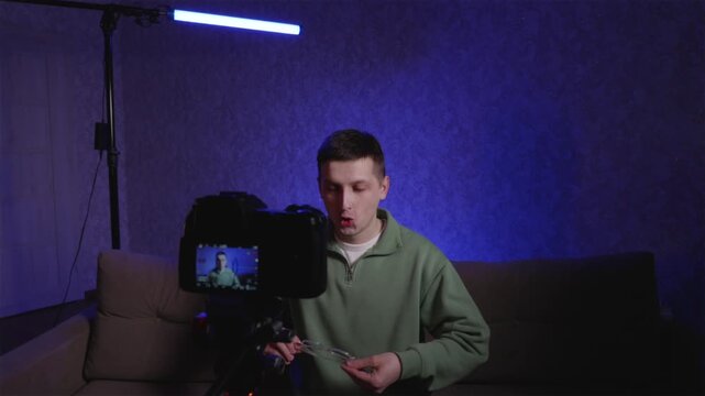 Tech blogger recording video review with professional gear