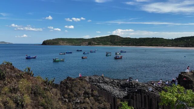 GANH DA DIA, PHU YEN, VIETNAM - JUNE 26, 2026: Drone footage captured flying from inland toward Ganh Da Dia (Da Dia Reef) in Dak Lak (formerly Phu Yen) Province, Vietnam. The drone passes over the ico