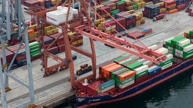 Aerial View of Container Ships at the Port of Vigo Illustrating Rising Import Export Tariffs and Global Inflation Barriers