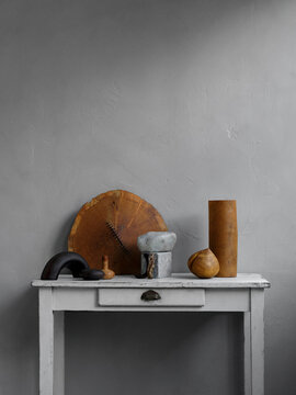 Handmade wooden organic products placed in a artful way. Art deco interior magazine