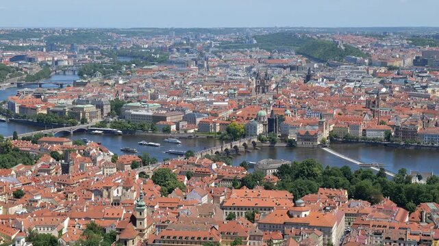 City of Prague in Czechia (Czech Republic). Zoom out view cityscape from the Charles Bridge on Vltava River with Old Town, Lesser Town (Mala Strana) and Castle District (Hradcany).
