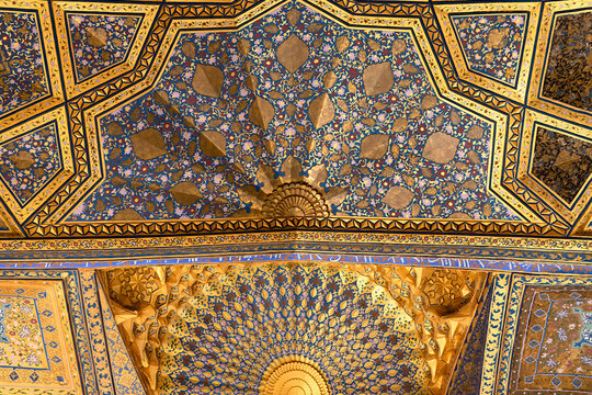 Gilded ceiling of Ak Saray Mausoleum in Samarkand with intricate Islamic geometric and floral ornamentation. Ideal for travel, heritage, and architectural publications.
