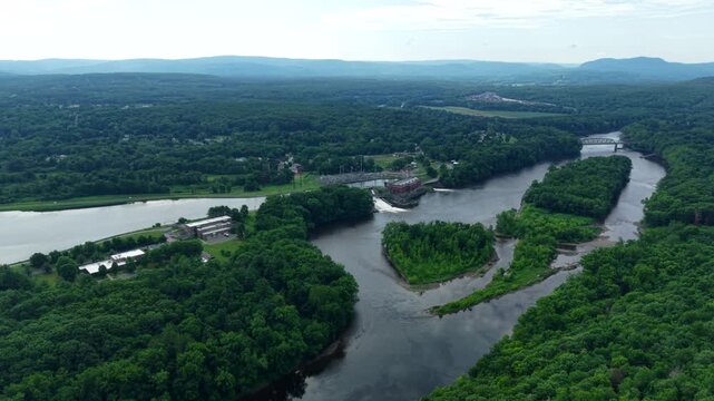Orbit Shot Over Connecticut and Deerfield Rivers Confluence With Turners Falls Hydroelectric Dam and Forested Islands Revealing the Natural and Industrial Heritage of Western Massachusetts