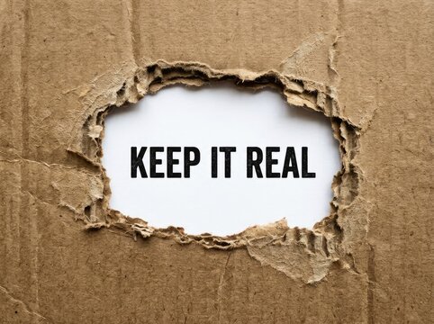 Torn cardboard revealing "KEEP IT REAL" text, representing authenticity and honesty Concept honesty and authenticity, conveying a message of being genuine and truthful
