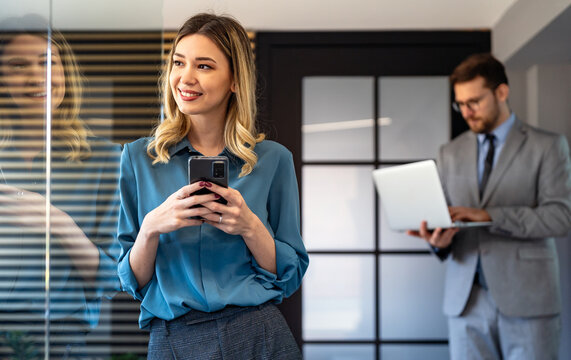 Confident business woman in modern office showcasing executive leadership, professional success
