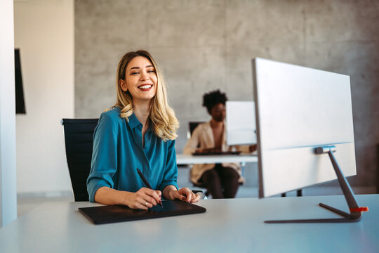 Smiling successful business woman, freelancer, coworker female leader using digital device, phone