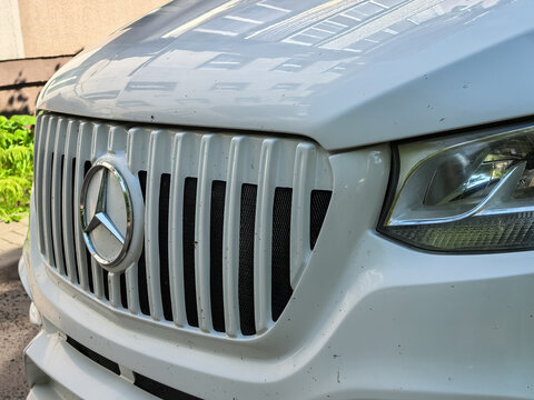 Mercedes Benz Sprinter van grille and headlight closeup editorial photo