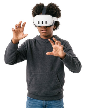 young boy with a vr headset is experiencing virtual reality and reaching out