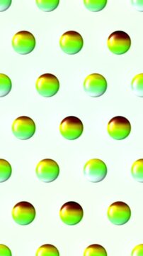 Gold and green glossy spheres polka dot pattern on mint background, animated 3d balls, seamless looping vertical video