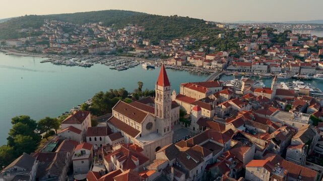 Croatia boasts Trogir captivating skyline and charming harbor. This picturesque historic town invites travelers to wander through its ancient streets and enjoy vibrant waterfront views at sunset.