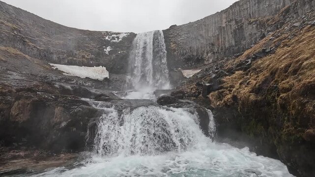 Svodufoss waterfall close-up, white cascade and turbulent plunge pool, columnar basalt walls, Snaefellsnes Peninsula, Iceland