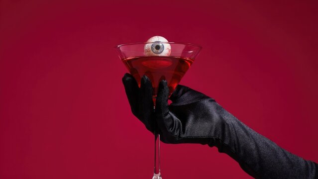 Halloween cocktail with eyeball garnish