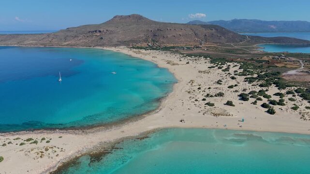 Explore the breathtaking beauty of Simos Beach on Elafonisos. This serene paradise features crystal-clear waters, soft sands, and stunning landscapes perfect for relaxation and adventure.