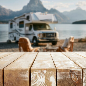 Beach camping scene on a sandy tropical shoreline under a bright blue sky. Copy space for product placement or advertising text with relaxing outdoor summer atmosphere.