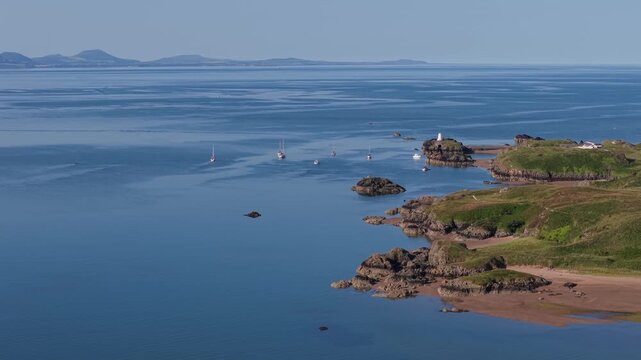 LLanddwynn lighthouse by drone slow downwards pan