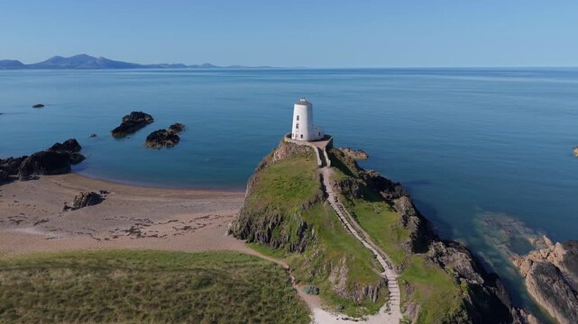 Medium height drone footage of llanddwynn castle circling right to left