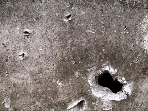 Black and white height map texture of damaged military BMP armor with shrapnel hits and bullet holes.