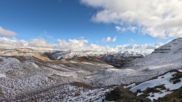 Snowy ridge walk overlooking the Annapurna and Nilgiri massif, Upper Mustang, Nepal