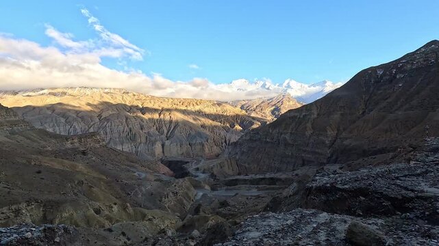 Car window POV sliding down the Kali Gandaki gorge at Chele, Annapurna on the horizon, Nepal