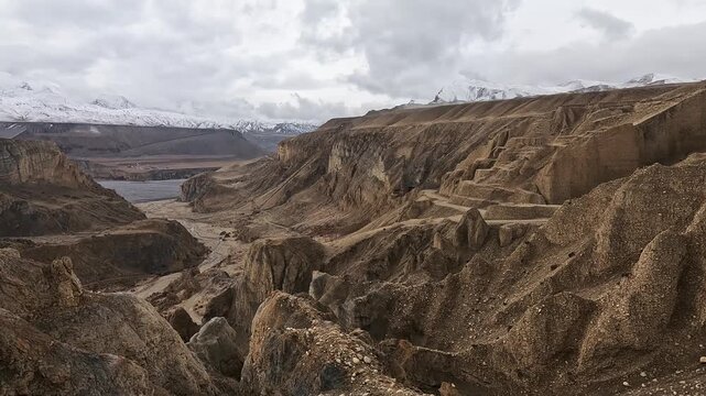 Eroded canyon and switchback road descending toward Kali Gandaki, Upper Mustang, Nepal