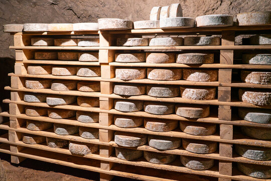 Italia, in the Julian Alps a Cheese aging cellar located in closed mines.