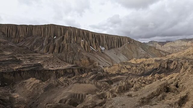 Organ pipe fluted badland cliffs carved by erosion near Yara, Upper Mustang, Nepal