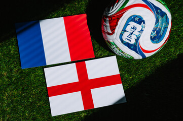 Fototapeta premium FIFA World Cup 2026 third place match: France vs England, national flags before international football match. Illustrational editorial photo