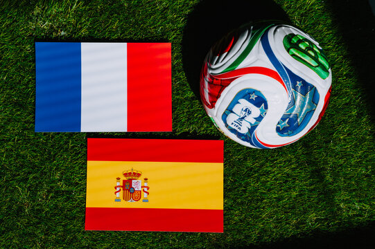 FIFA World Cup 2026 semifinal: France vs Spain, French and Spanish national flags displayed before the decisive football game. Illustrative editorial photo