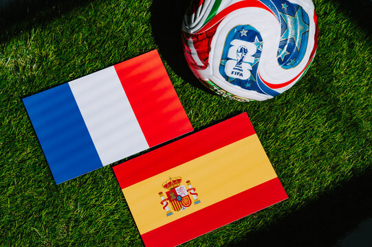 FIFA World Cup 2026 semifinal: France vs Spain, national flags symbolizing the upcoming World Cup football semifinal clash. Conceptual editorial image