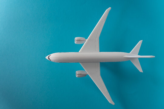 Horizontal image of an airplane against a blue background