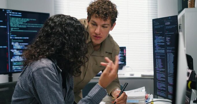  Latin software engineer and colleague discuss architecture debug code review server logs and plan deployment workflows with attention to security scalability and product goals

