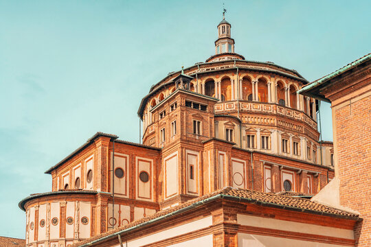 Historic brick architecture of Santa Maria delle Grazie church in Milan.