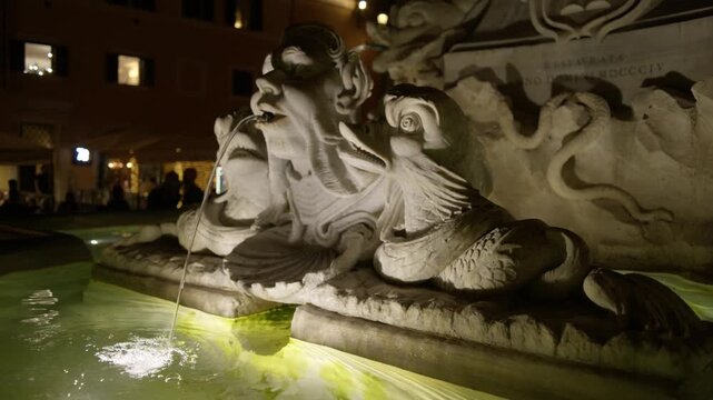 Illuminated Pantheon Fountain Marble Figures and Water Basin at Night in Rome Italy Shot with Cinema Camera