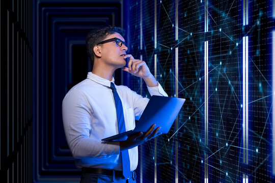 Technician working on the server in the data storage room. 