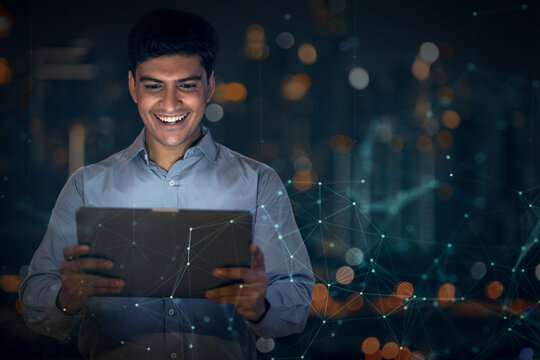 Digital Composite Image Of Businessman Using a digital tablet